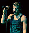 https://upload.wikimedia.org/wikipedia/commons/thumb/6/63/Macklemore_The_Heist_Tour_1_cropped.jpg/100px-Macklemore_The_Heist_Tour_1_cropped.jpg
